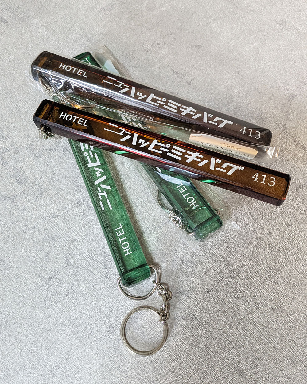 Happy Mikiburg Hotel Keychain